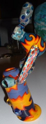 The stem and bowl in this hand-blown glass bubbler are internal. Compare to the diagram at the left.
