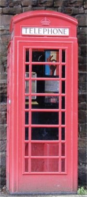 A K6 red telephone box designed by Sir 