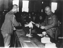 Chen (right) signed a surrender instrument with General Rikichi Ando (left), governor- general of Taiwan, in Taipei City Hall.