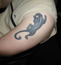 Tattoo of a black leopard