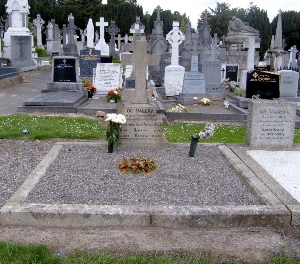 amon de Valera's grave. His wife, Sinead, and son, Brian (who was killed in a horse-riding accident in 1936) are buried there also. (Close up view of the gravestone)