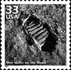USPS stamp of human spacesuit bootprint on the lunar surface.