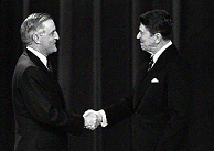 Mondale shakes hands with Ronald Reagan before a debate in 1984.