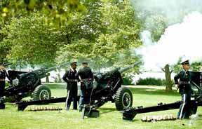A 21-gun salute is fired by the members of the U.S. Army.