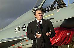 Chancellor  with a new Luftwaffe  Typhoon. The name "Typhoon" caused controversy since the  was an RAF ground-attack aircraft which destroyed many targets in support of the ground forces invading France in June 1944 and afterwards