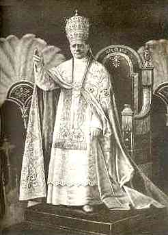 Pope Pius XI (1922-1939) wearing a papal tiara.