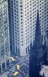 Trinity Church, at the corner of Broadway and Wall Street in New York City, viewed from the  