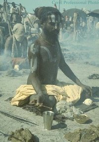  (Hindu ascetic) are often seen meditating in  (lotus pose). Used with permission from www.kamat.com