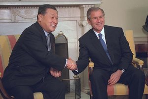 Prime Minister Mori met with  in the Oval Office in March 2001.