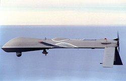 Predator Unmanned Aerial Vehicle flies on a simulated Navy aerial reconnaissance flight off southern California in December 1995. (Nose is to the left)