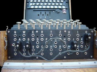 The plugboard (Steckerbrett) is positioned at the front of the machine, below the keys. When in use, there can be up to 13 connections. In the above photograph, two pairs of letters are swapped (S-O and J-A).