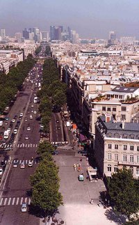 Avenue de la Grande Armée, one of Haussmann's twelve grand avenues radiating from the .  and the  (the hollow white cube) can be seen on the horizon.