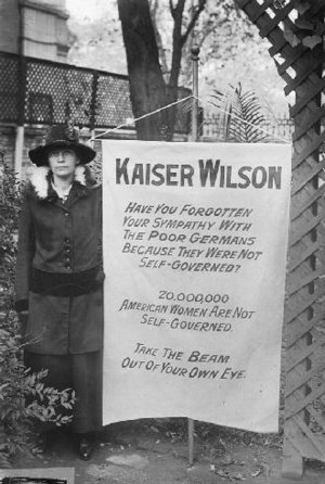 Suffragette with banner, Washington DC, 1918