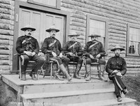 NWMP (now RCMP) Officers, Yukon, 1900, wearing the contemporary uniform that includes a flat brimmed stetson hat.