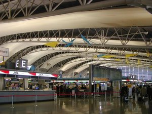 4th floor ticketing hall, illustrating the terminal's airfoil roof.