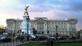 Buckingham Palace and the "Victoria memorial". This principal facade of  by  was redesigned in  by Sir .