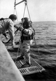 U.S. Navy diving dress being lowered into the water