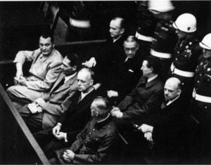 Defendants in the dock - Front row: Gring, Hess, von Ribbentrop, and Keitel. Second row: Dnitz, Raeder, Schirach, Sauckel.
