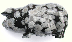 Pig carved in snowflake obsidian, 10 cm (4 inches) long.