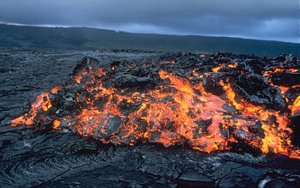 Glowing ‘a‘a flow front advancing over pāhoehoe on the coastal plain of Kīlauea in .