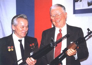 Mikhail Kalashnikov (holding an ) and Eugene Stoner, designer of M-16 (holding an AK-47)