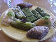 A plate with pieces of different types of Baklava