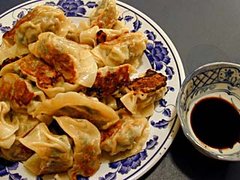A plate of fried dumplings, about to be served for dinner.