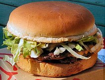 Hamburgers often contain lettuce, onions, and other toppings, as shown here.