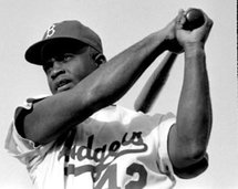Brooklyn Dodger infielder Jackie Robinson broke the color barrier in major league baseball in 1947. (Photograph by Bob Sandberg, 1954.)