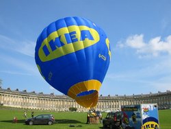 A hot air balloon launching in front of the Royal Crescent