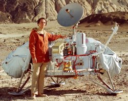 Sagan with a model of the  probes which would land on .
