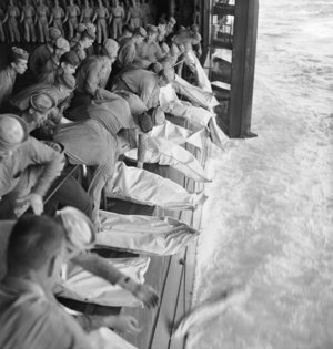 Burial at sea for the victims of the USS Intrepid, hit by Japanese bombs during operations in the Philliphines, November 26 1944