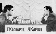 The   was between  (right) and Garry Kasparov (left).