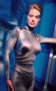 Jeri Ryan as , wearing the silver  for which the character was noted.