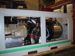 A Stirling engine and generator set with 55 kW electrical output, for combined heat and power applications. Click image for detailed description.