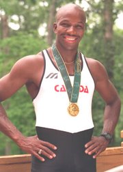 Donovan Bailey with one of his Olympic gold medals.