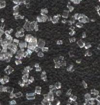 Magnified view of refined sugar crystals.